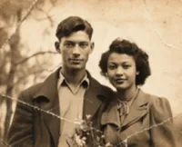 Damaged vintage couple portrait photo used as a photo restoration sample